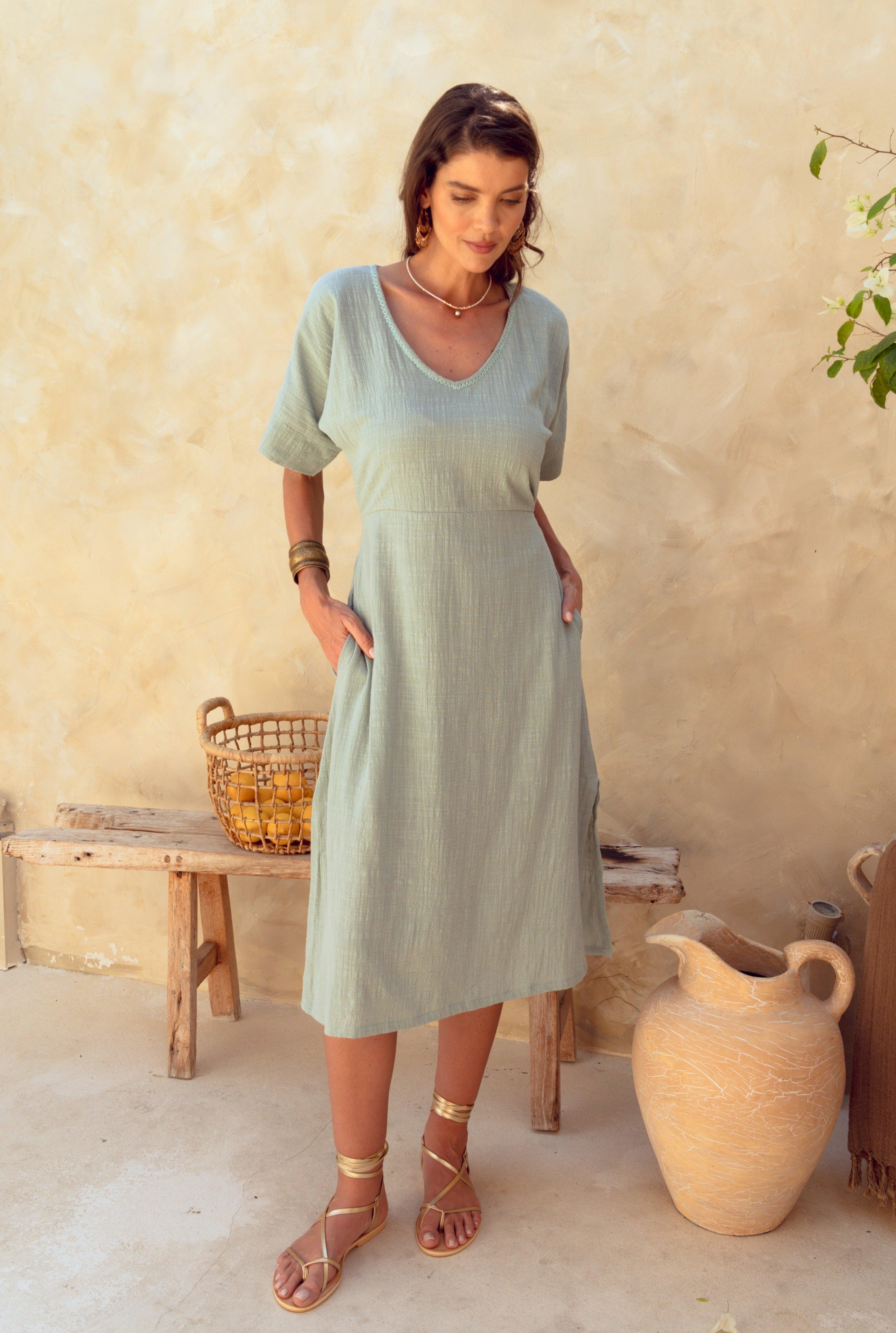 Harla 100% light blue cotton muslin kaftan dress with gladiator gold sandals