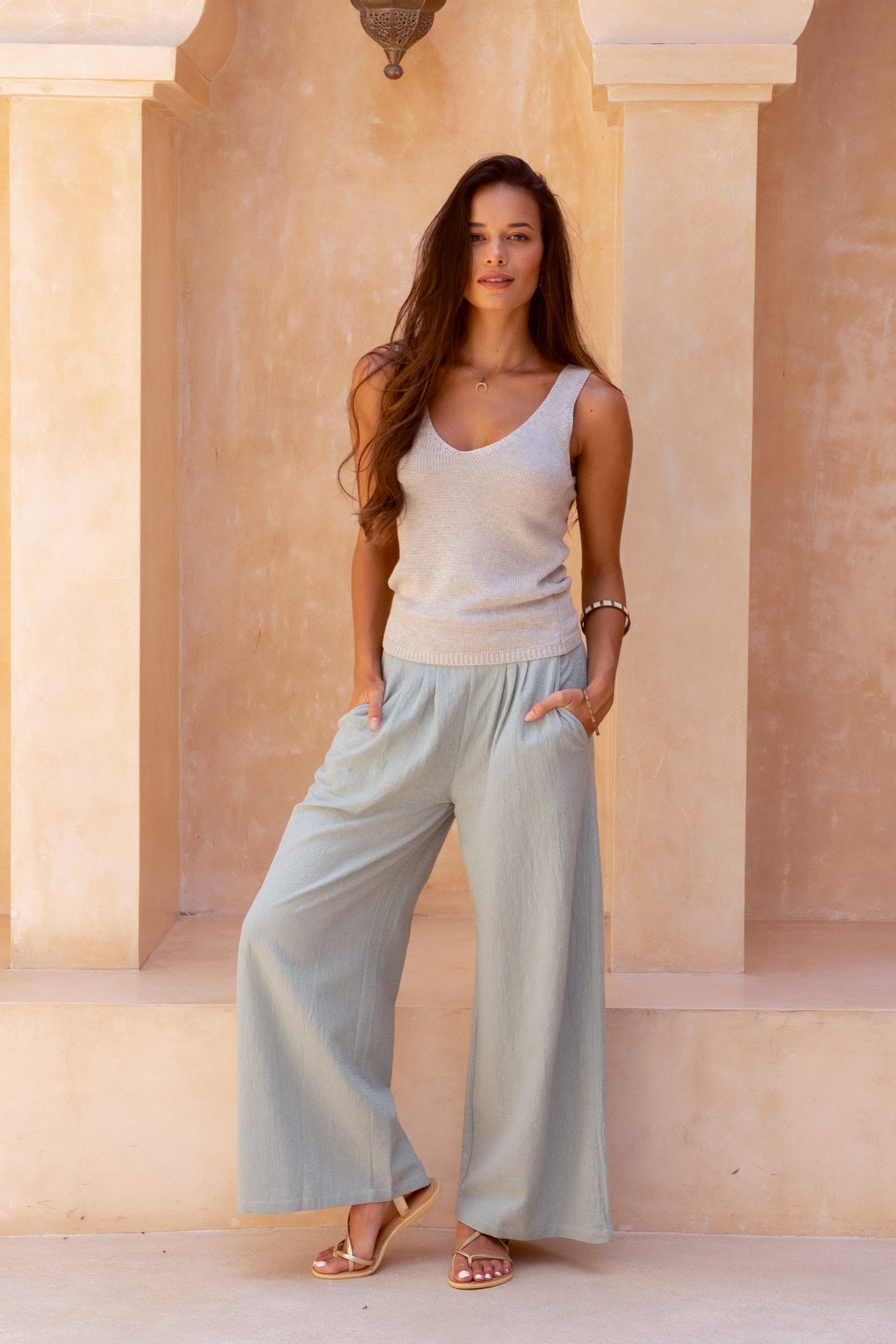 Harla cotton - linen trousers in sage with cool grey 100% cotton knit tank top and gladiator style gold sandals