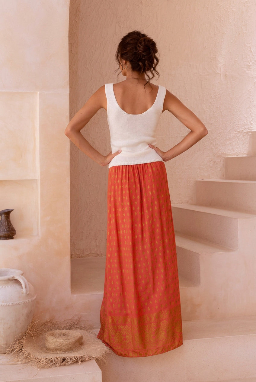 Harla coral and gold maxi skirt with creme 100% cotton knit tank top and gladiator style sandals in shimmering gold